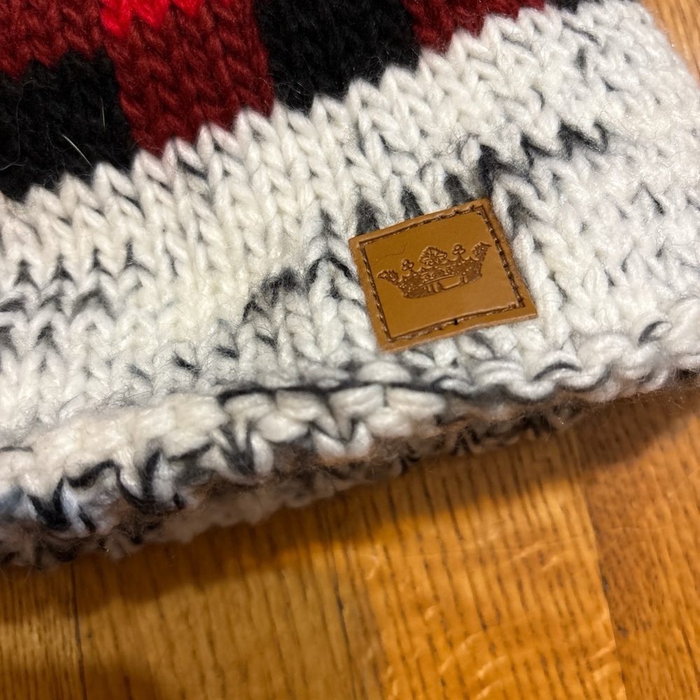 Infinity Raine Red and Black Plaid Beanie with Faux Fur Pom - Picture 3 of 6